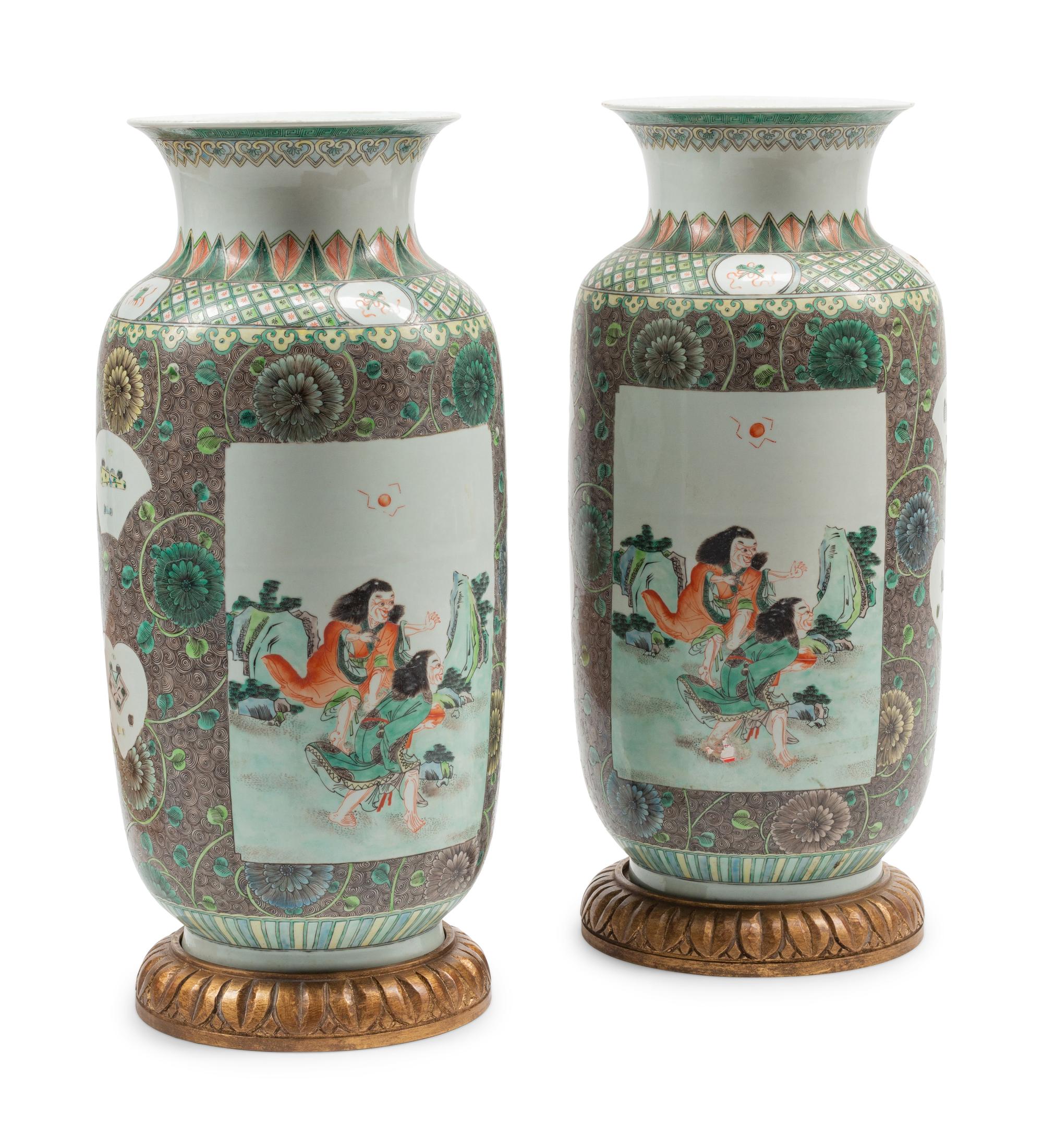 A Pair of Chinese Export Enameled Porcelain Vases on Carved Giltwood Bases