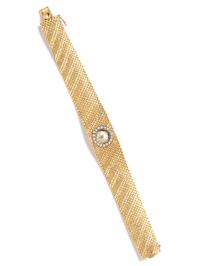 A 14 Karat Yellow Gold and Diamond Wristwatch, Geneva,