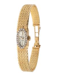 BELFONT, YELLOW GOLD AND DIAMOND WATCH