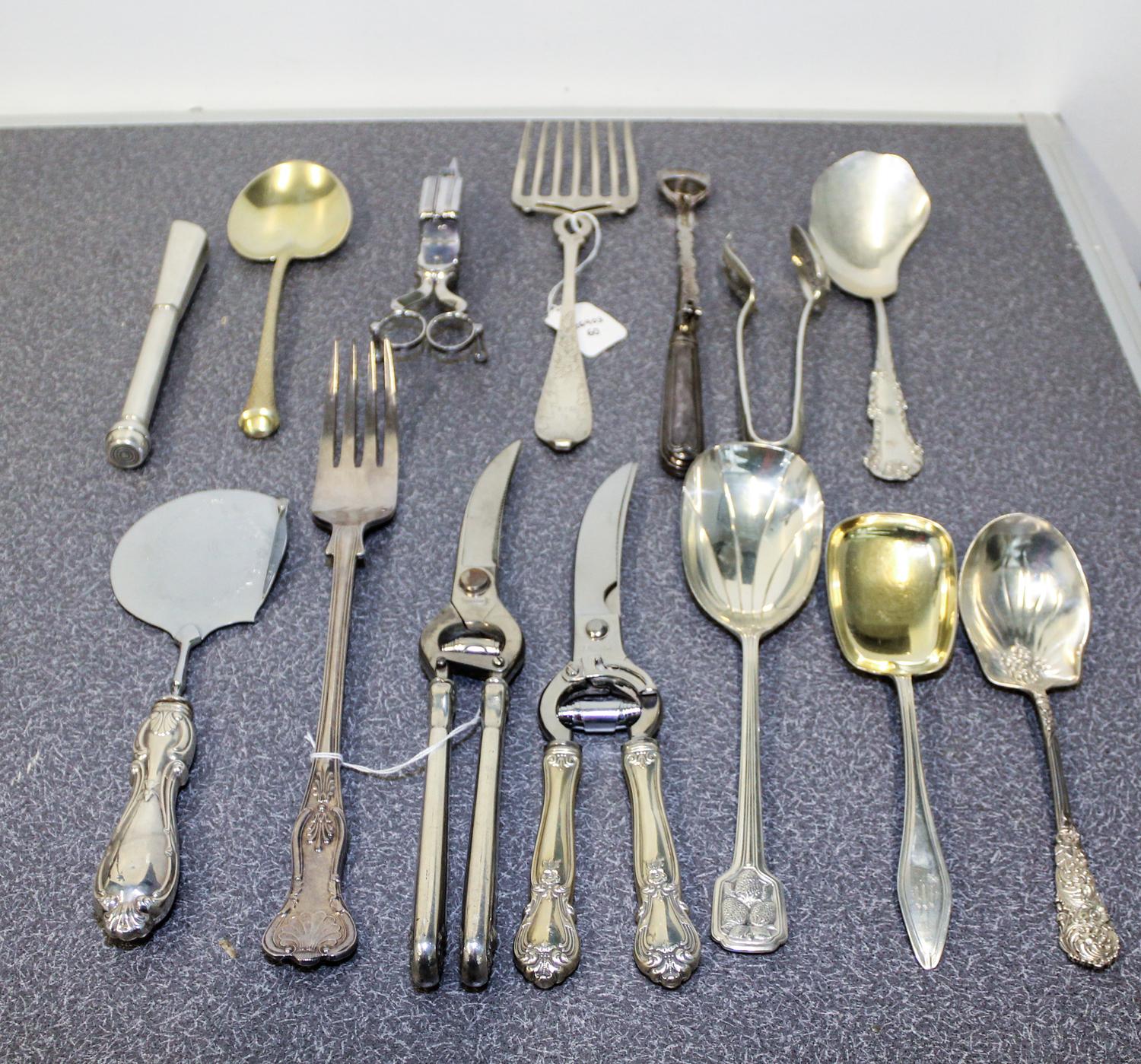 A Collection of Silver and Silver-Plate Serving and Table Articles Length of longest 12 3/4 inches.