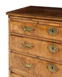 A George II Walnut Chest of Drawers