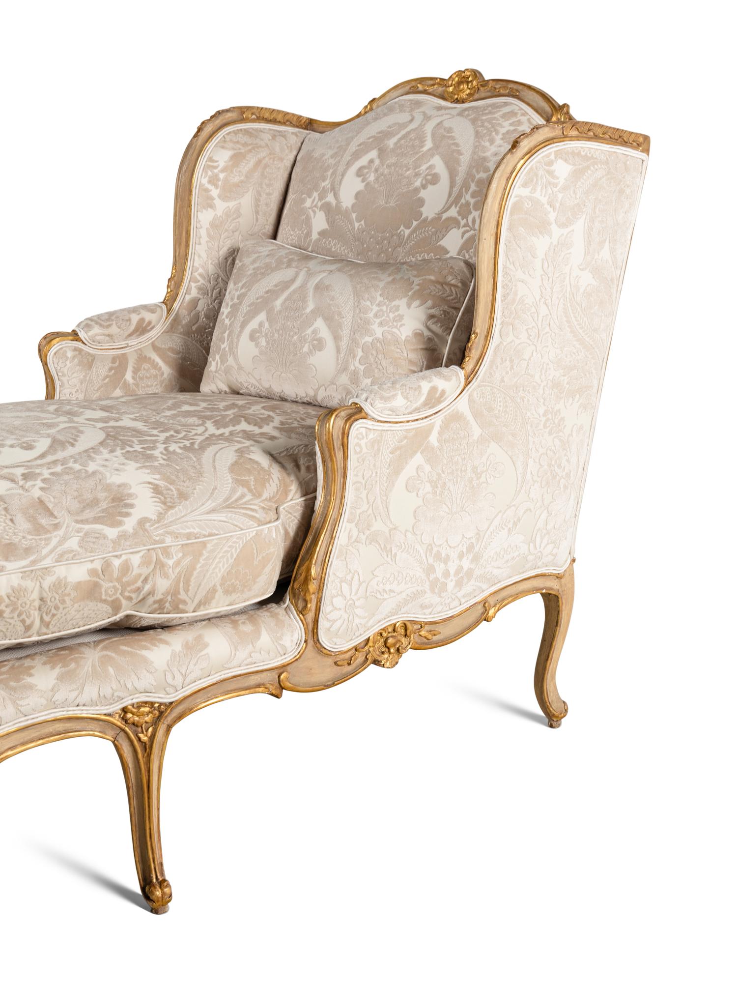 A Louis XV Painted and Parcel Gilt Duchesse en Bateau