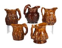 Five Rockingham Glaze Water Pitchers
