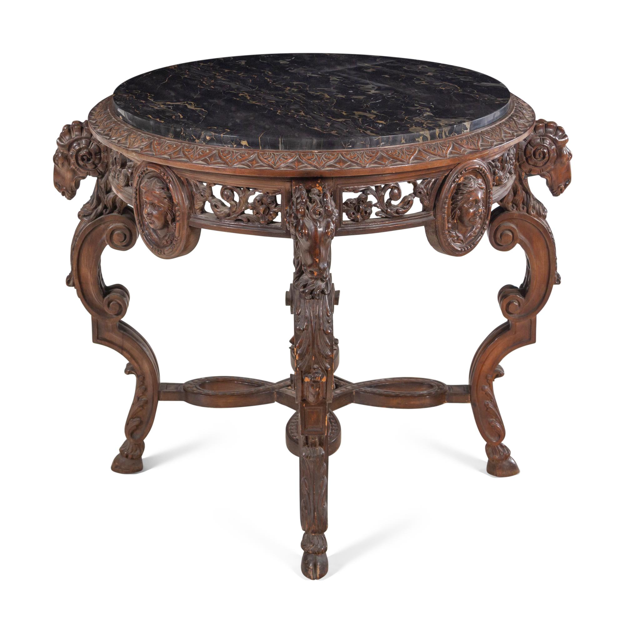 An Italian Carved Walnut Marble-Top Table