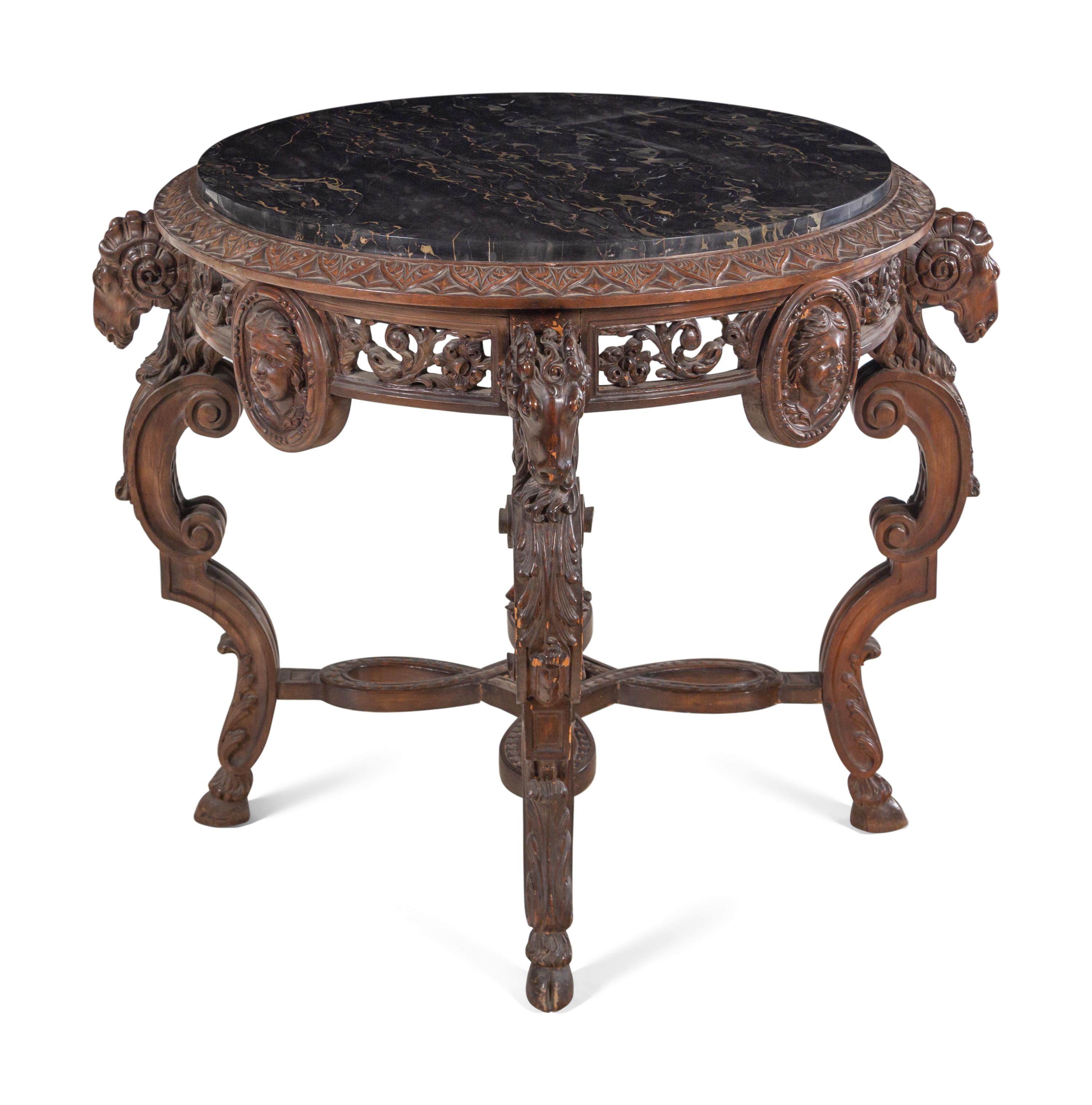 An Italian Carved Walnut Marble-Top Table