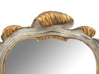 An Italian Baroque Style Silvered and Giltwood Mirror