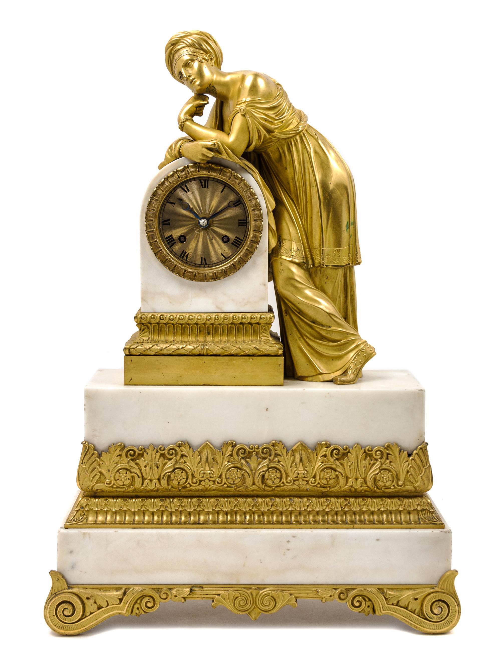 A French Gilt Bronze Mounted Marble Mantel Clock Height 21 inches.