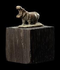 An Egyptian Silver Hippopotamus