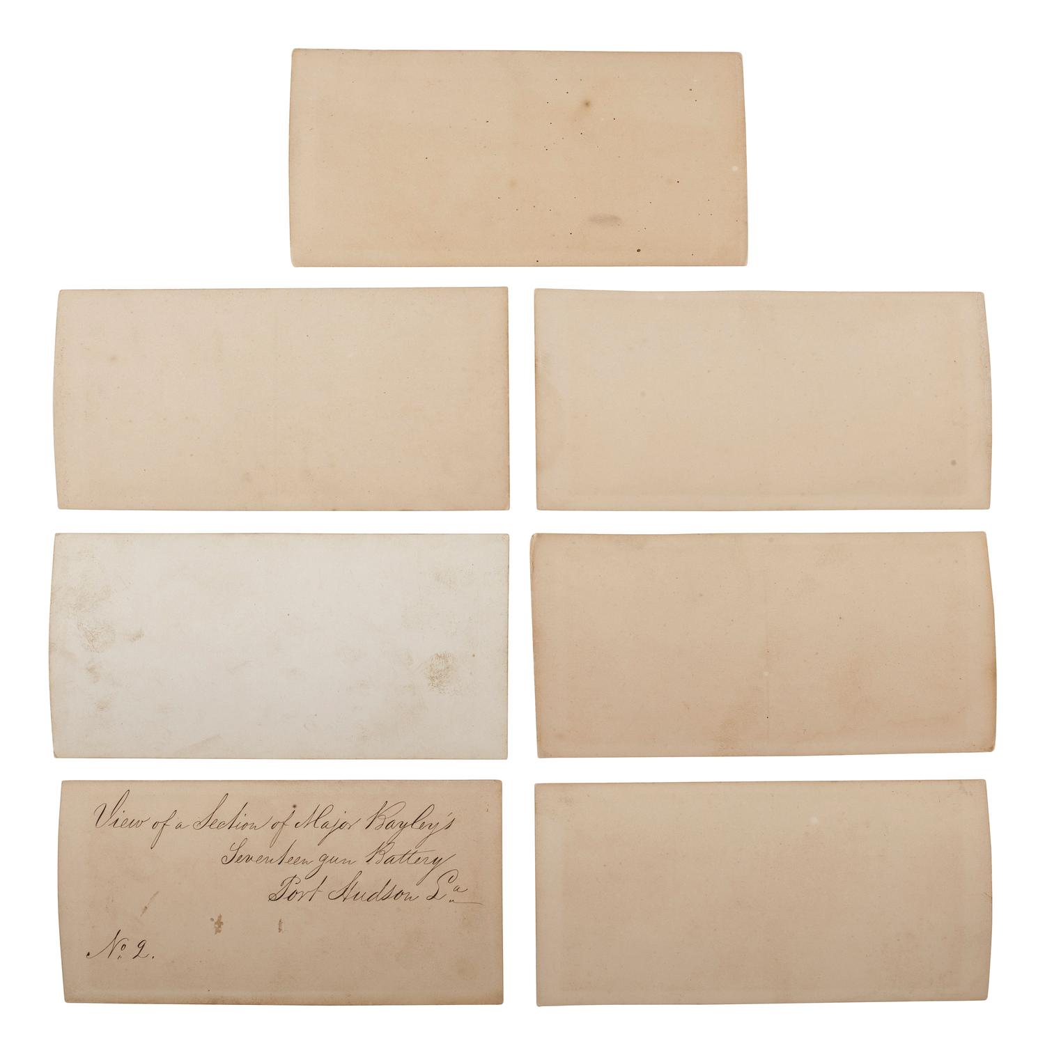 [CIVIL WAR]. A group of 7 stereoviews of cannon and guns taken at Port Hudson, Louisiana, following the siege. [Baton Rouge, LA]: [McPherson & Oliver, attrib. ca 1863-1864].