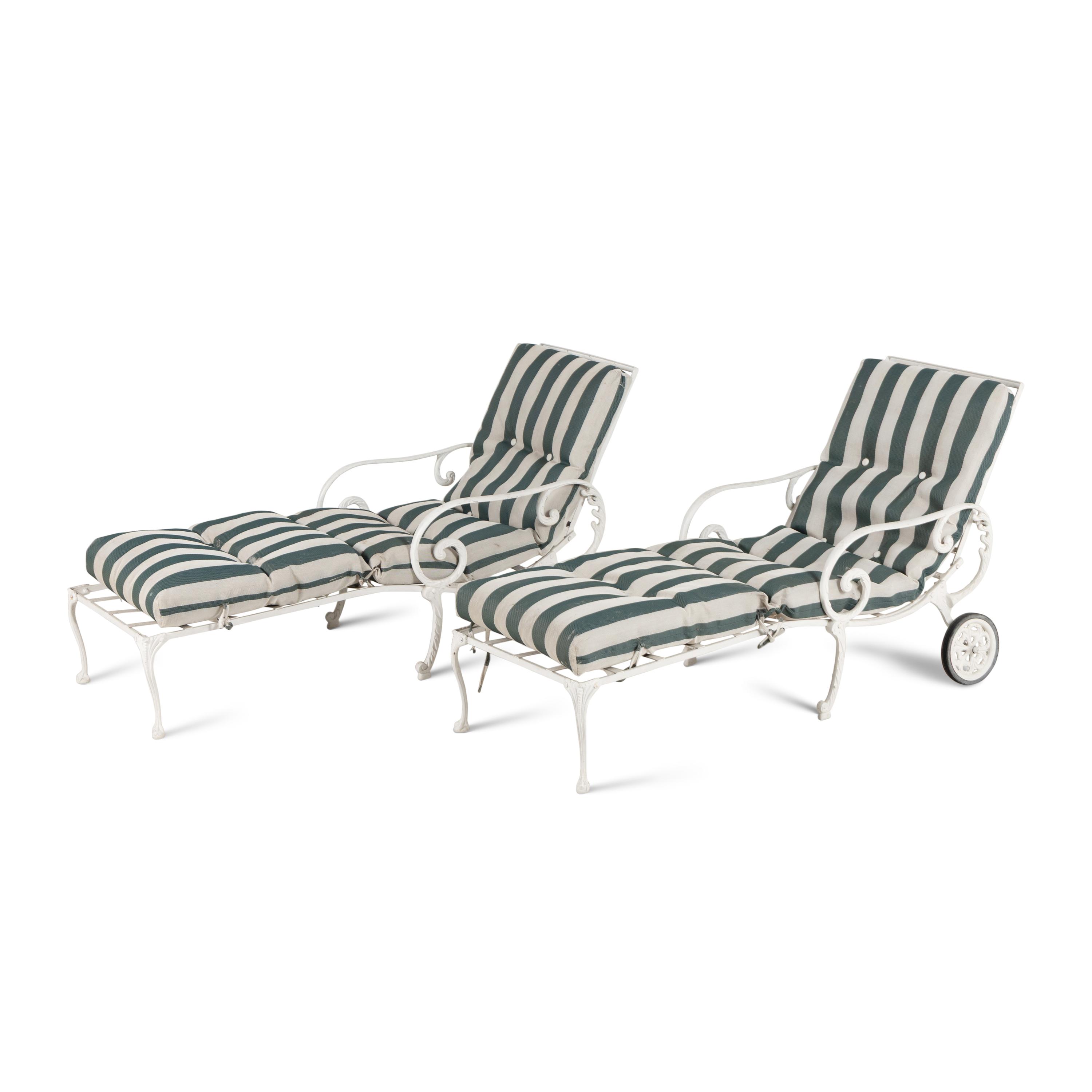 A Pair of White-Painted Metal Outdoor Chaise Longues