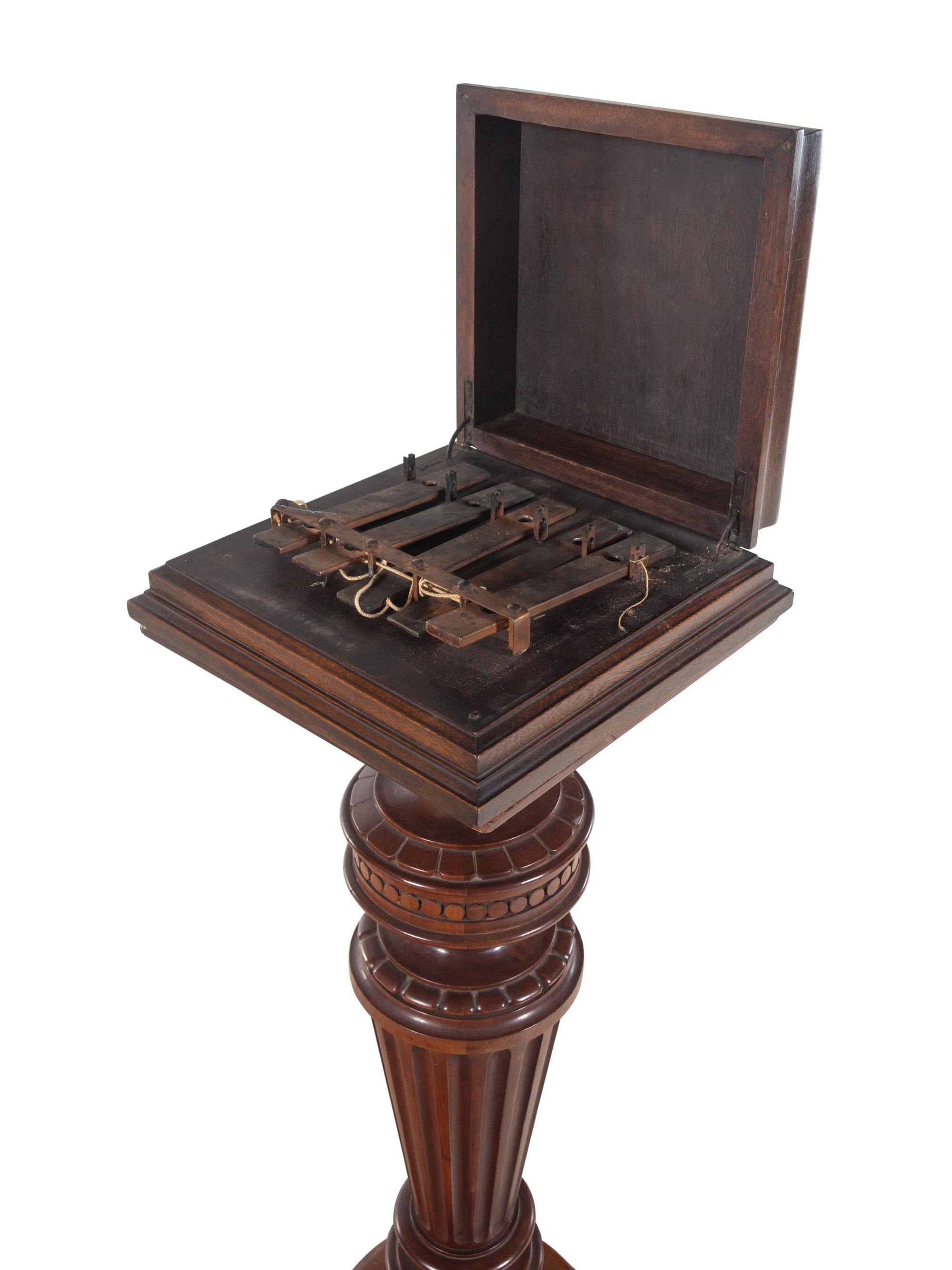 A Victorian Walnut Dinner Bell Pedestal