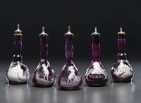 Five 'Mary Gregory' Amethyst Glass Barber Bottles