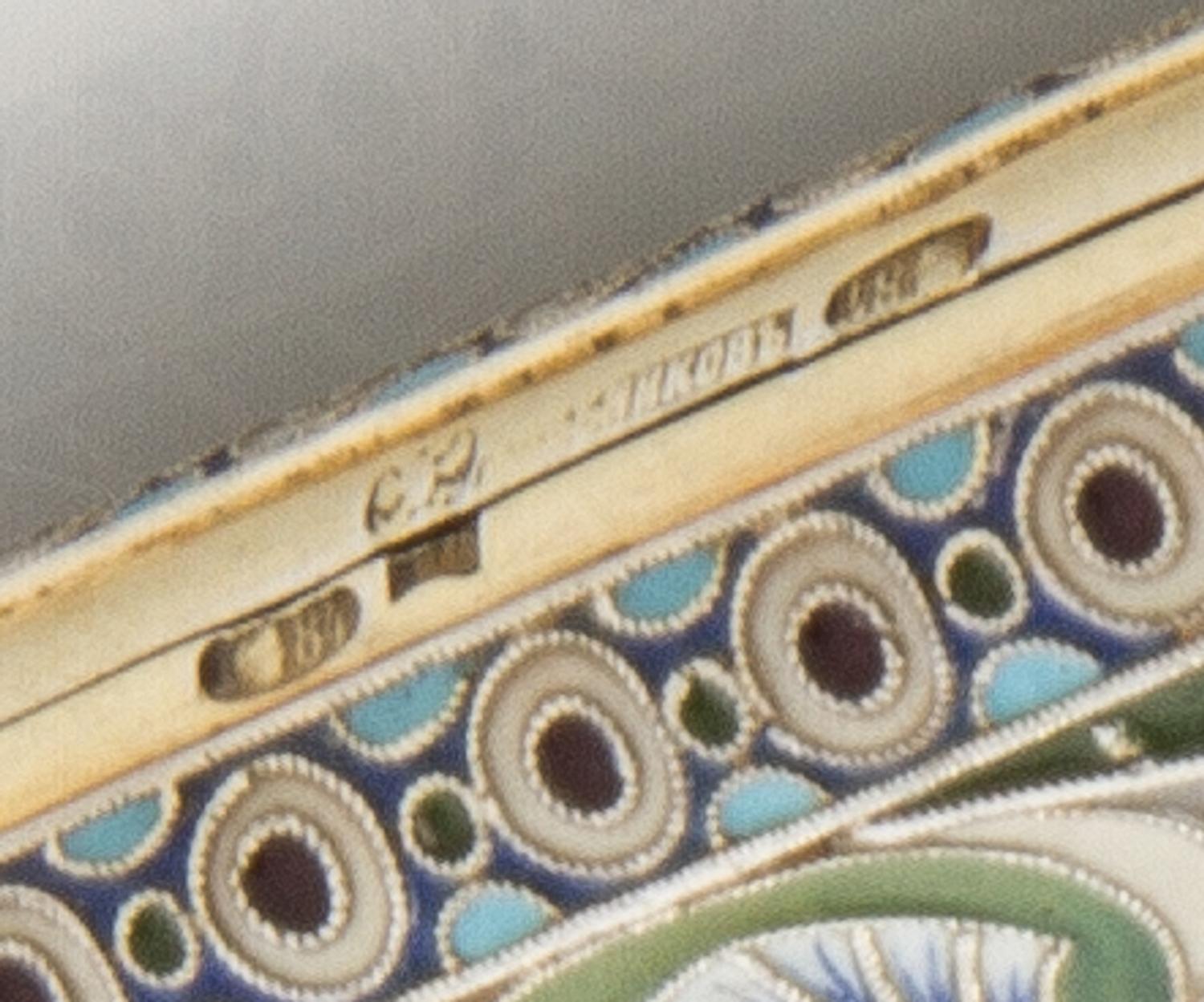 A Russian Enameled Silver Cigarette Case, Mark of I.P. Khlebinikov with Imperial Warrant, Moscow, 19th century, the case having a gilt