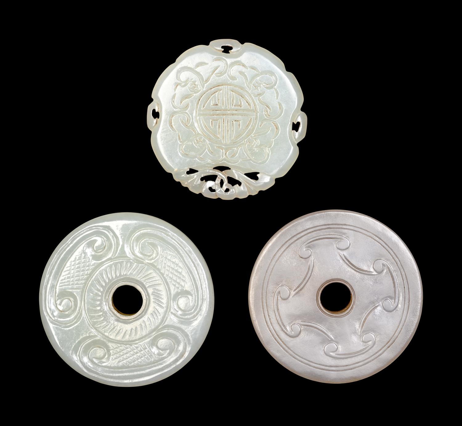 Three Chinese Pierced and Reticulated Jade Plaques