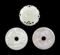 Three Chinese Pierced and Reticulated Jade Plaques