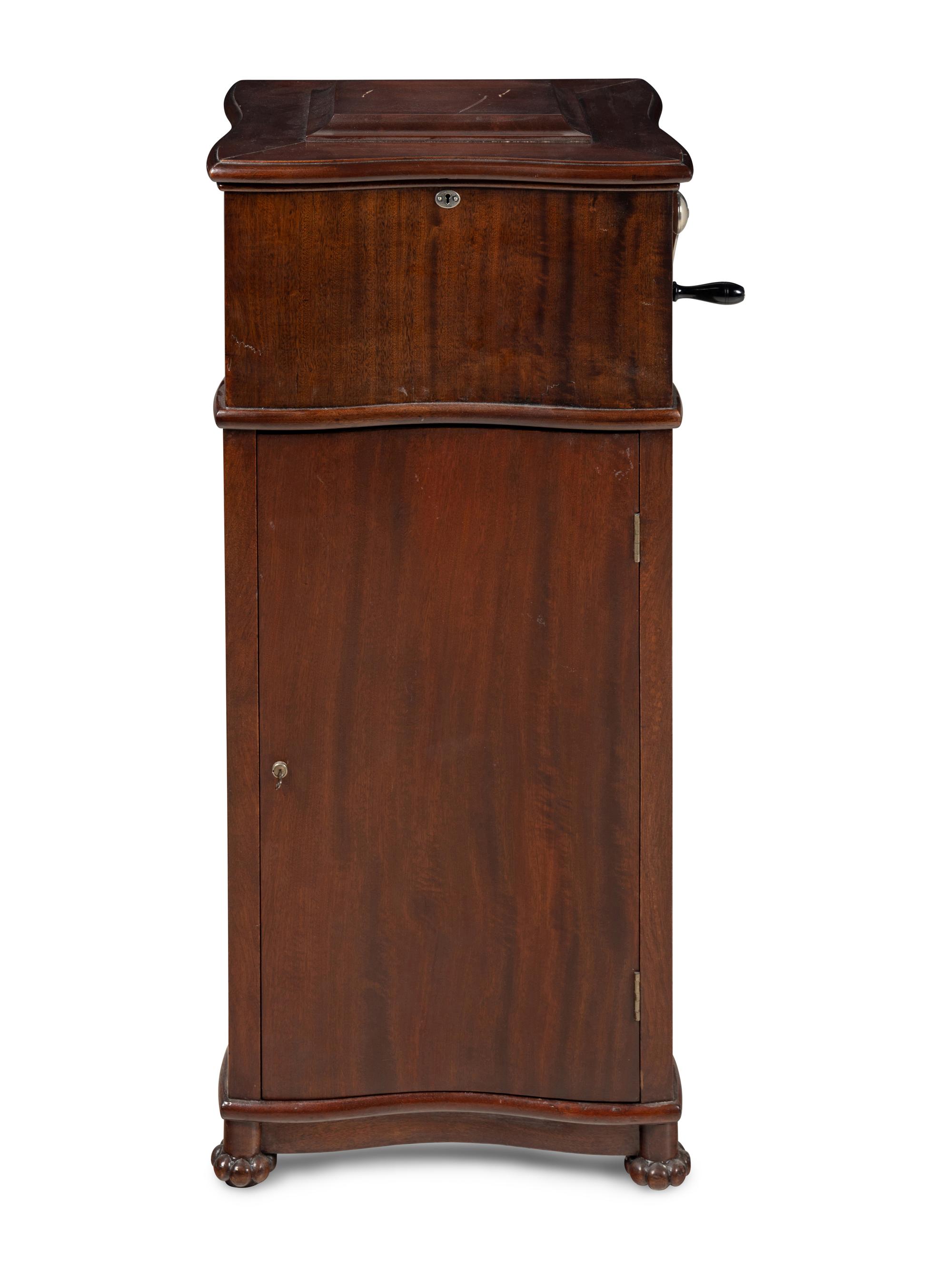 A Reginaphone Combination 12 Inch Disc Music Box and Phonograph
