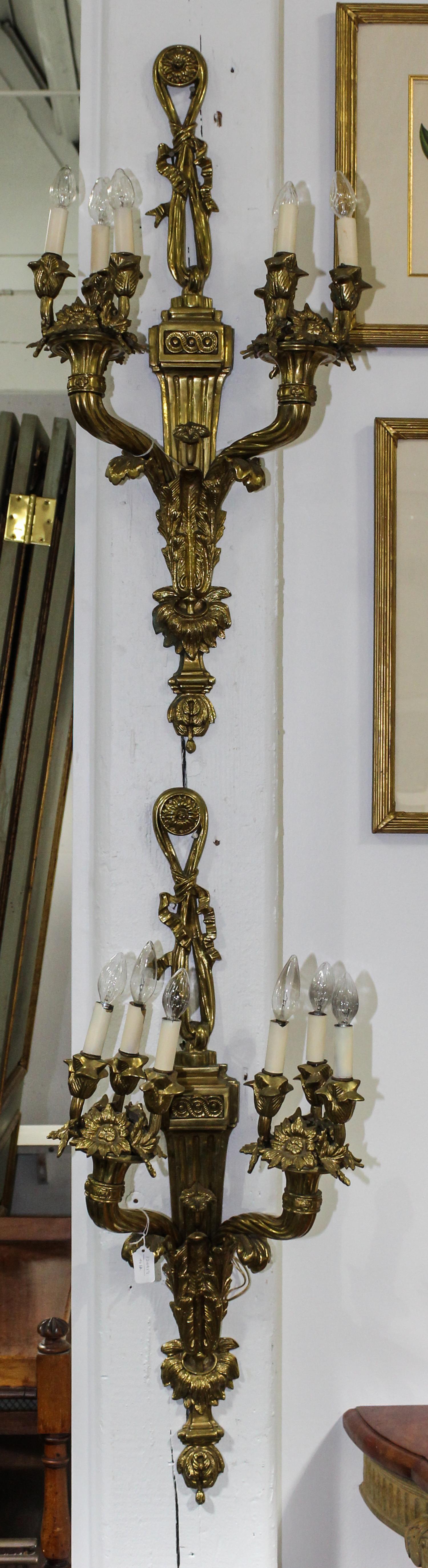 A Pair of Gilt Metal Sconces. Height 36 inches.