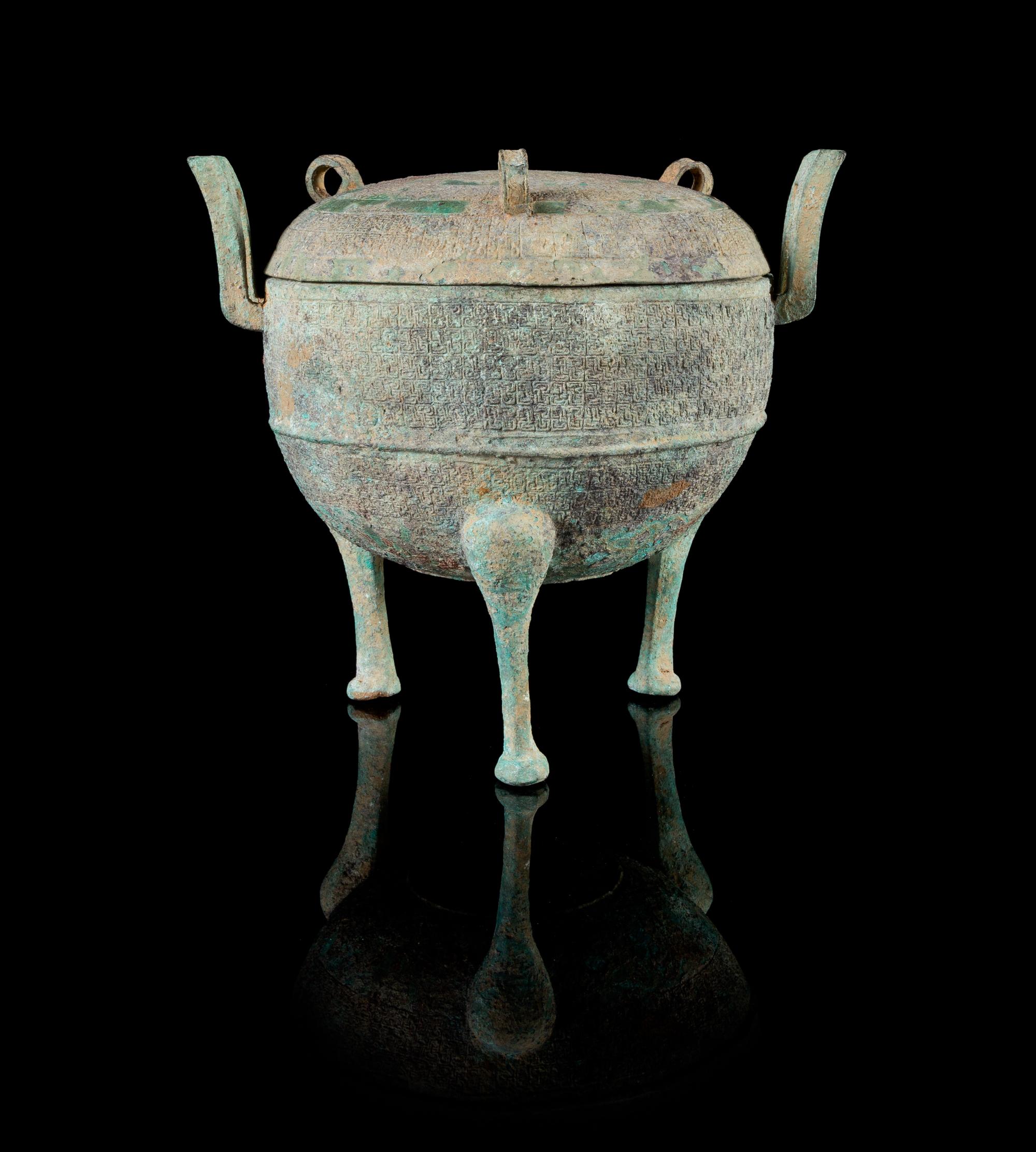 An Archaic Bronze Ding Vessel — LIKELY HAN DYNASTY
