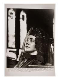 [KING, Martin Luther, Jr. (1929-1968)]. 2 press photos of Coretta Scott King, incl. at MLK funeral.