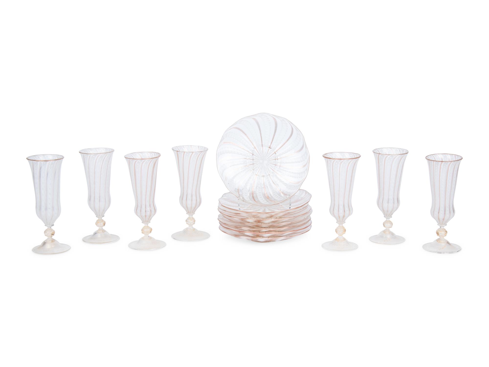 A Set of Murano Glass Champagne Flutes and Dessert Plates