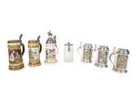 A Collection of German Pewter Mounted Steins