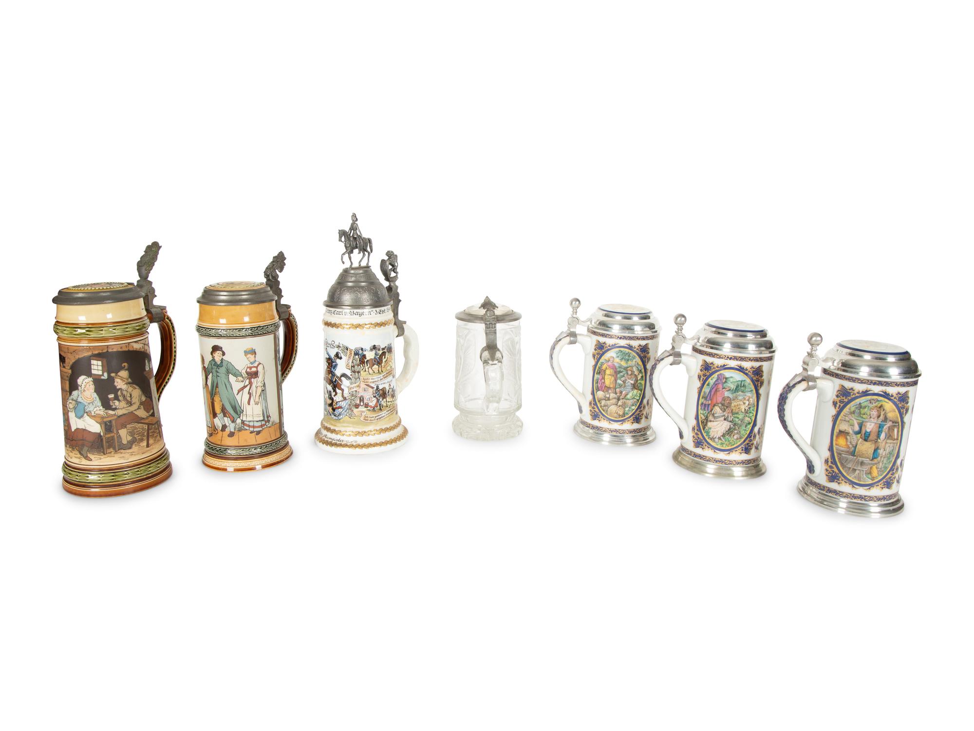 A Collection of German Pewter Mounted Steins
