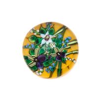 Attributed to Debbie Tarsitano, (Italian/American, b.1955), three petal flower miniature paperweight, on yellow ground