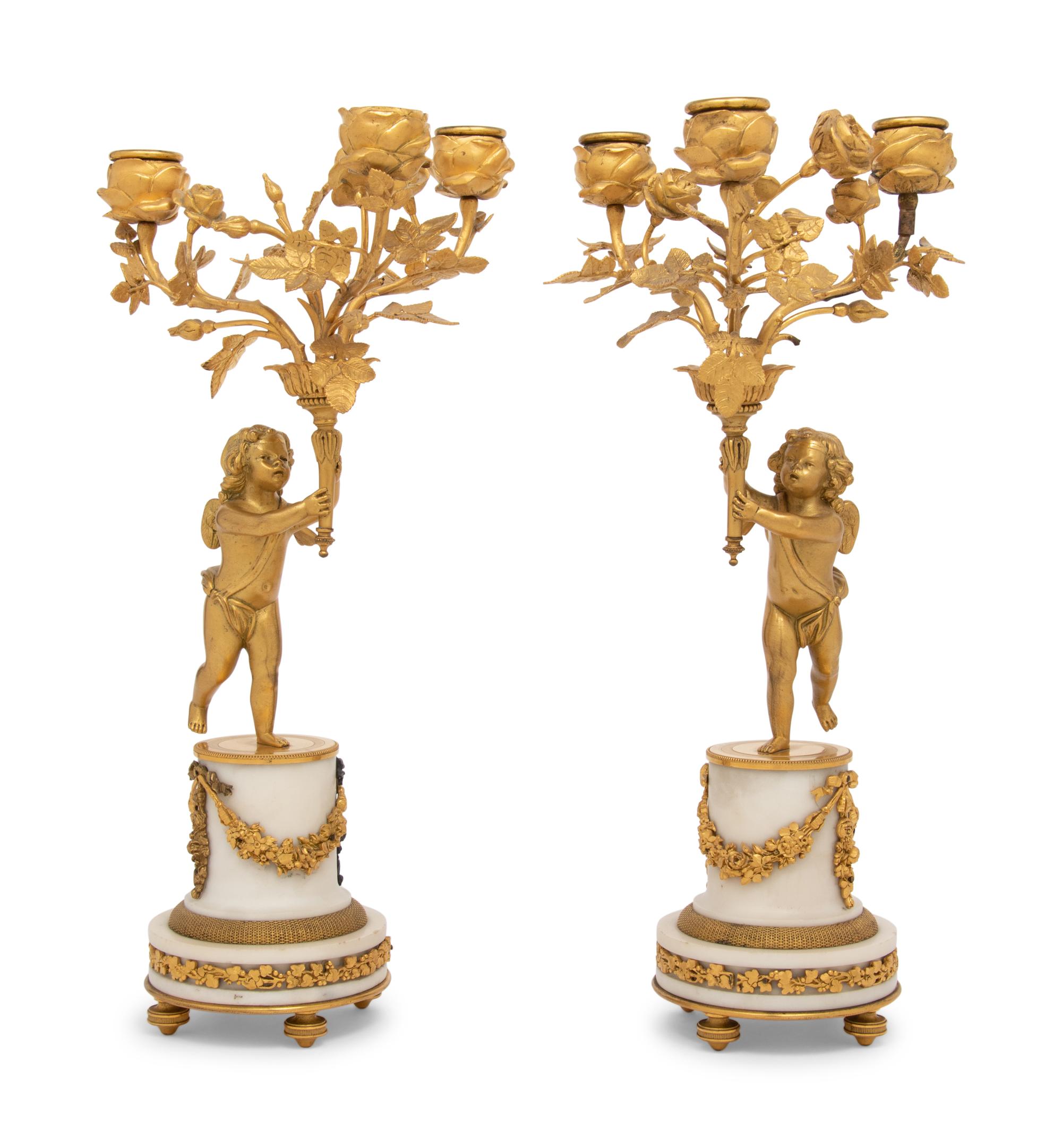 A Pair of Louis XV Style Gilt Bronze and Marble Three-Light Candelabra