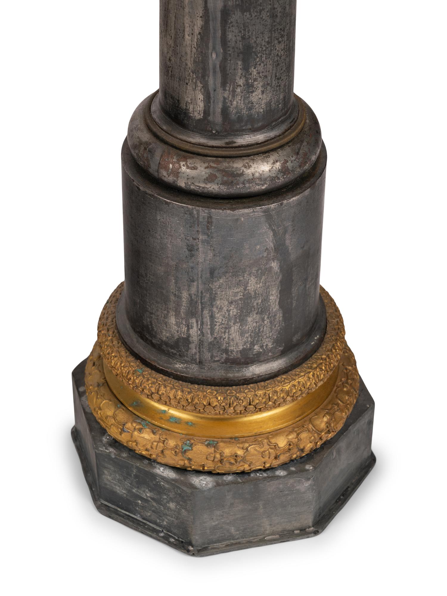 A Pair of French Gilt Bronze and Steel Columnar Lamps
