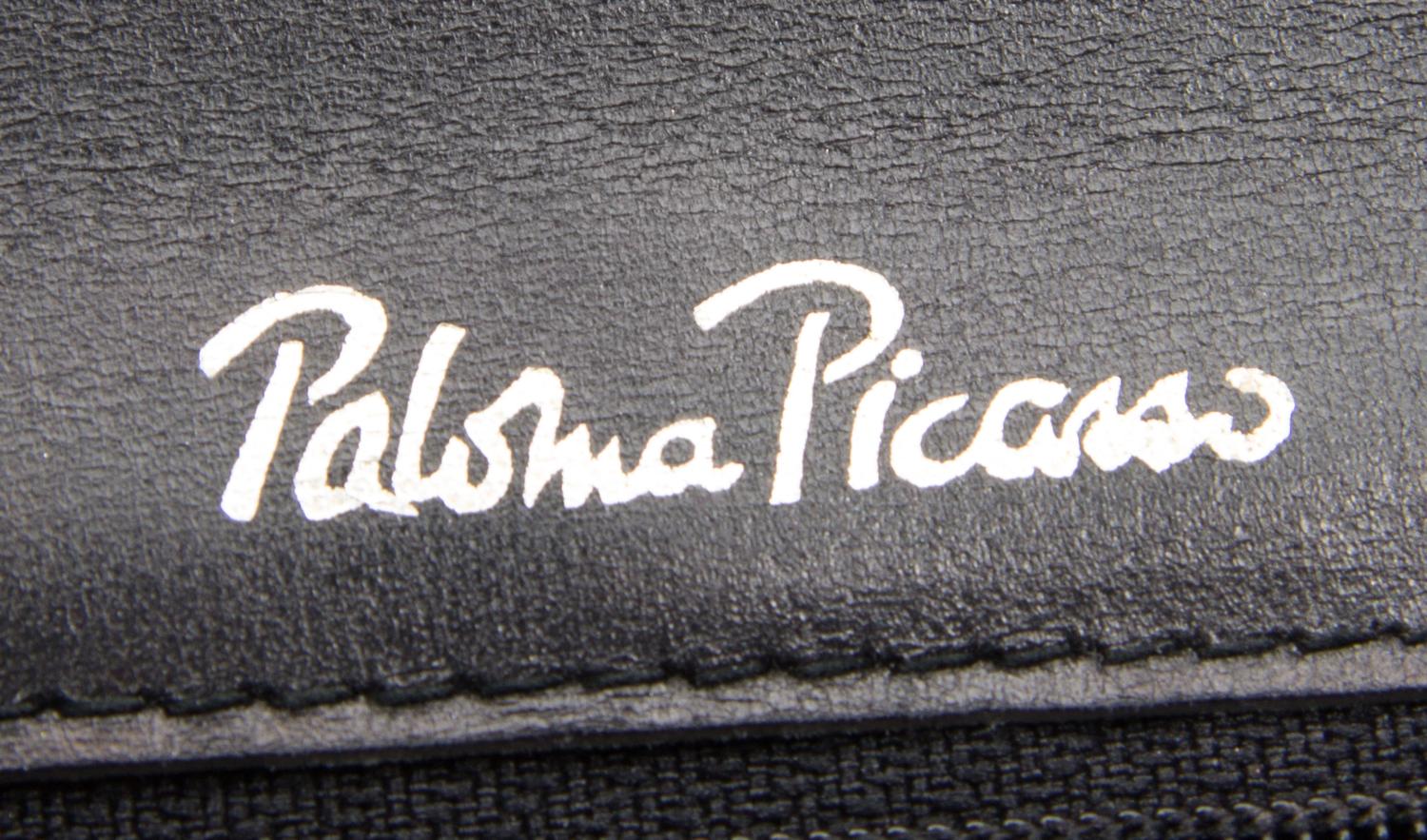 A Paloma Picasso Black Skin Handbag, 10" x 9" x 2.5".
