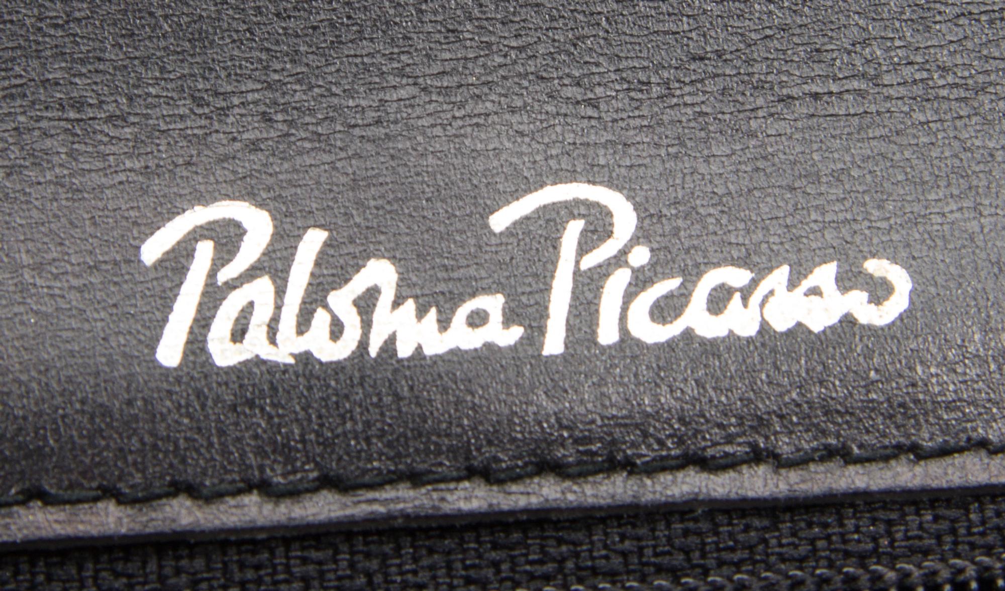 A Paloma Picasso Black Skin Handbag, 10" x 9" x 2.5".