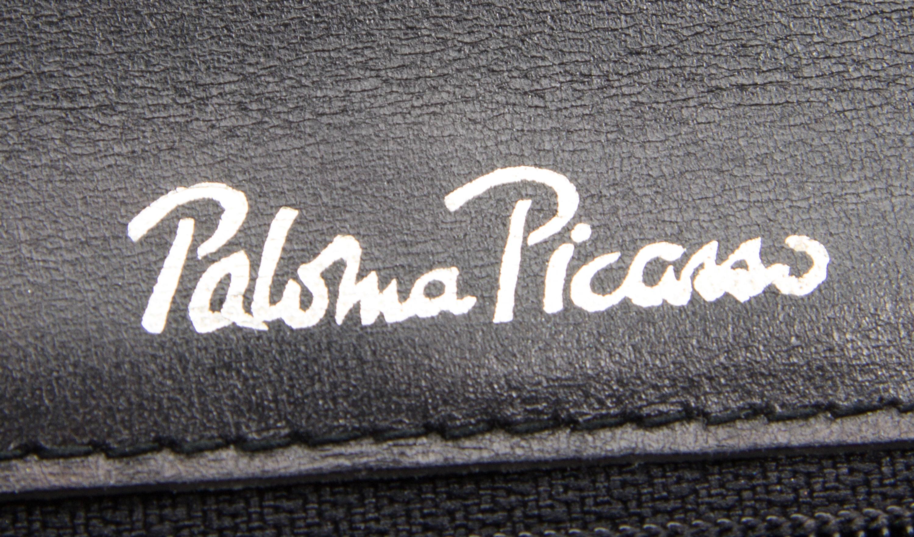 A Paloma Picasso Black Skin Handbag, 10" x 9" x 2.5".