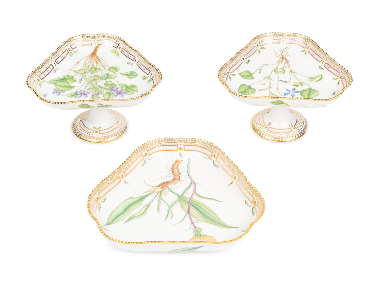 A Pair of Royal Copenhagen Flora Danica Porcelain Triangular Compotes and a Triangular Salad Bowl