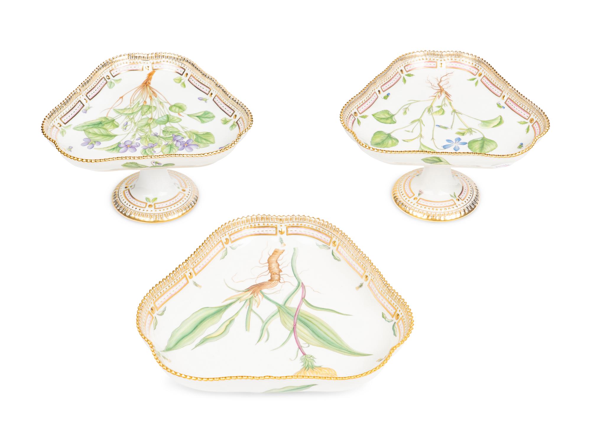 A Pair of Royal Copenhagen Flora Danica Porcelain Triangular Compotes and a Triangular Salad Bowl