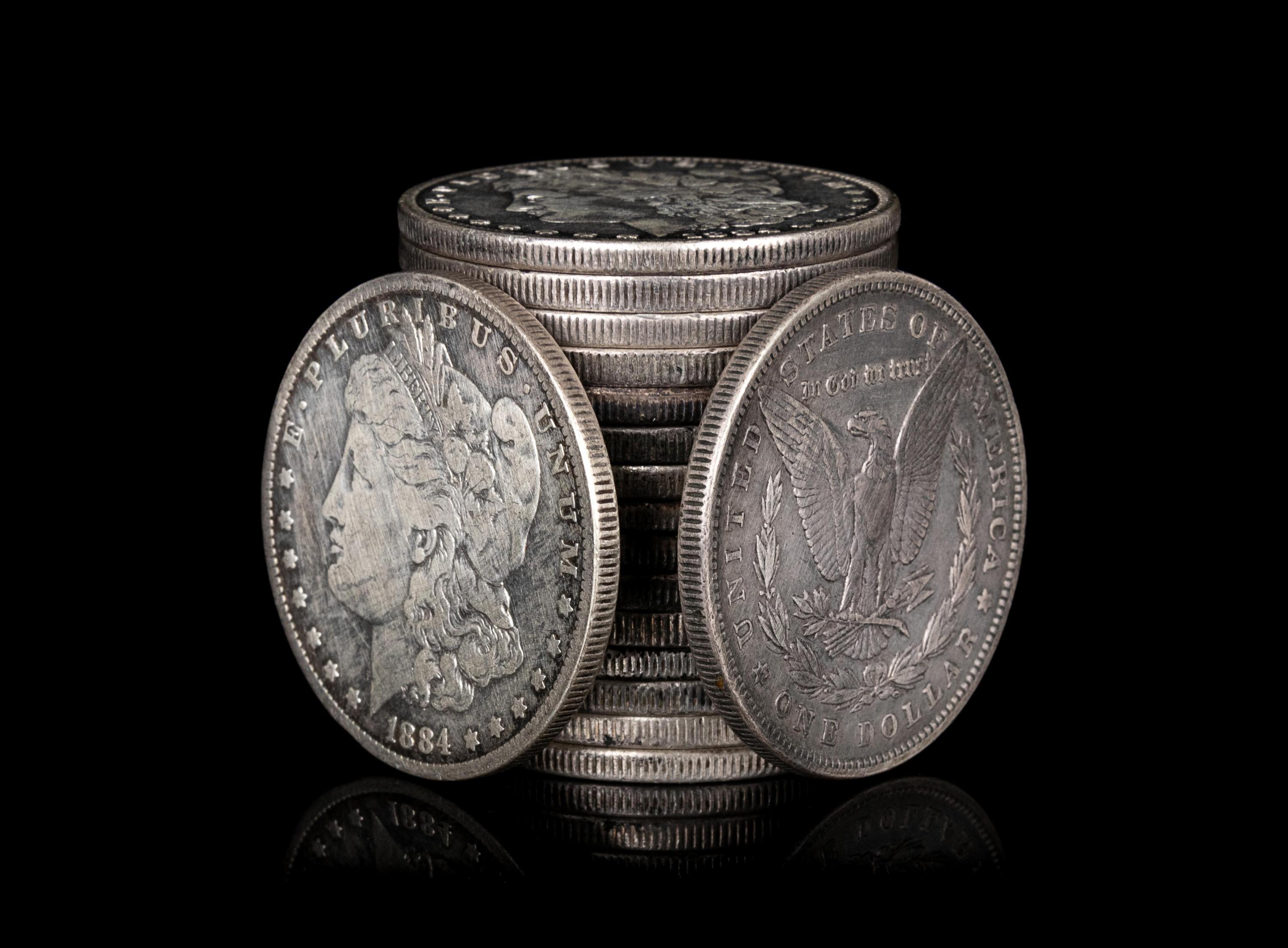 A Group of Seventeen Morgan $1 Coins