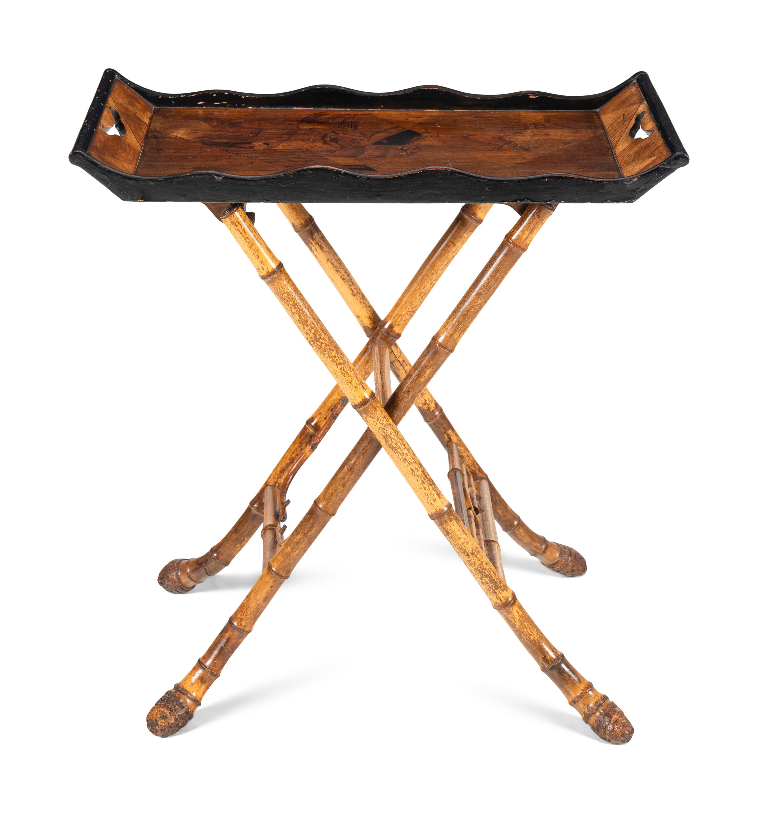A Victorian Part Ebonized Tray Table on a Faux Bamboo Stand