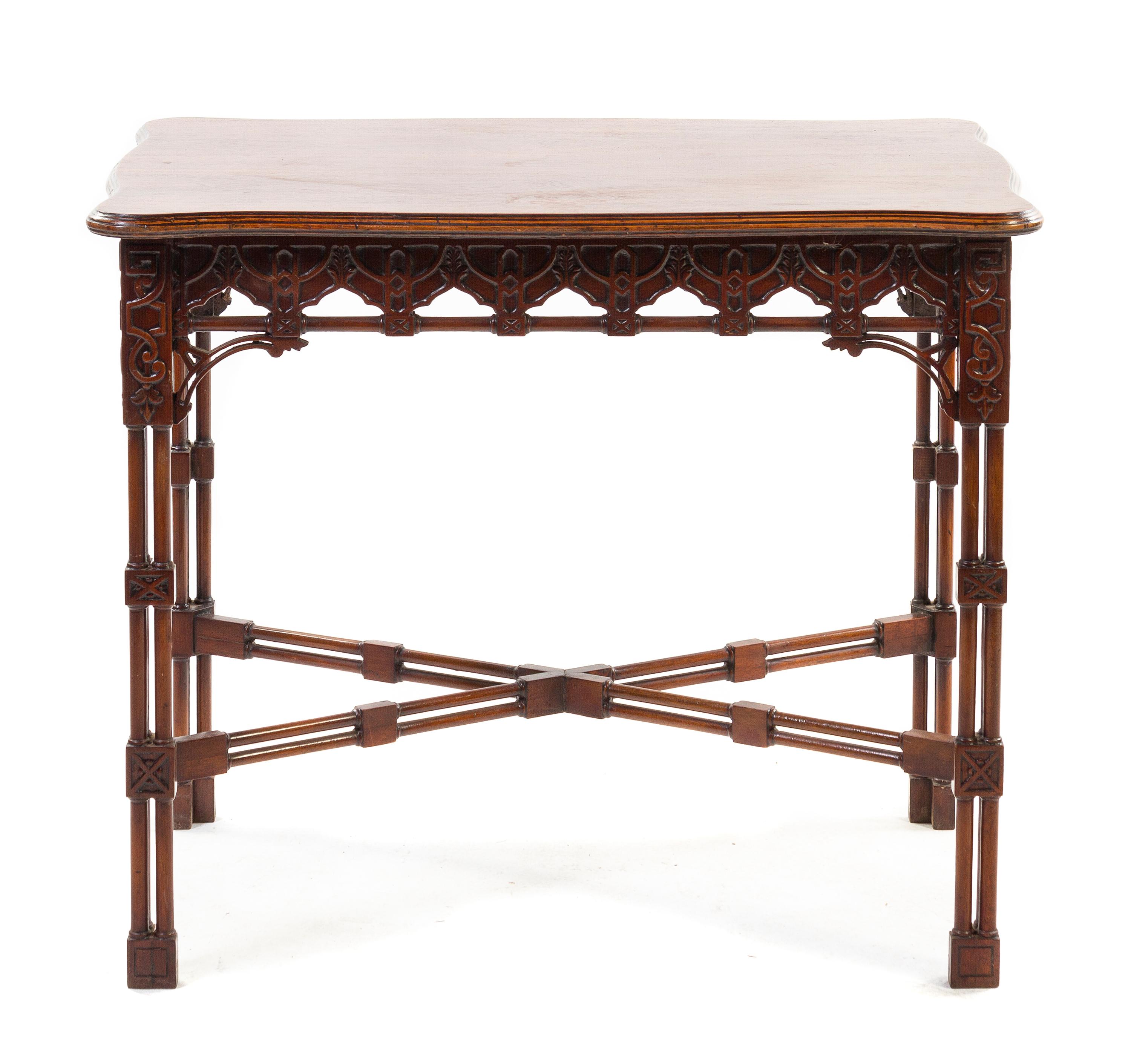A Chippendale Style Mahogany Occasional Table, Height 28 5/8 x width 34 1/4 x depth 23 inches.