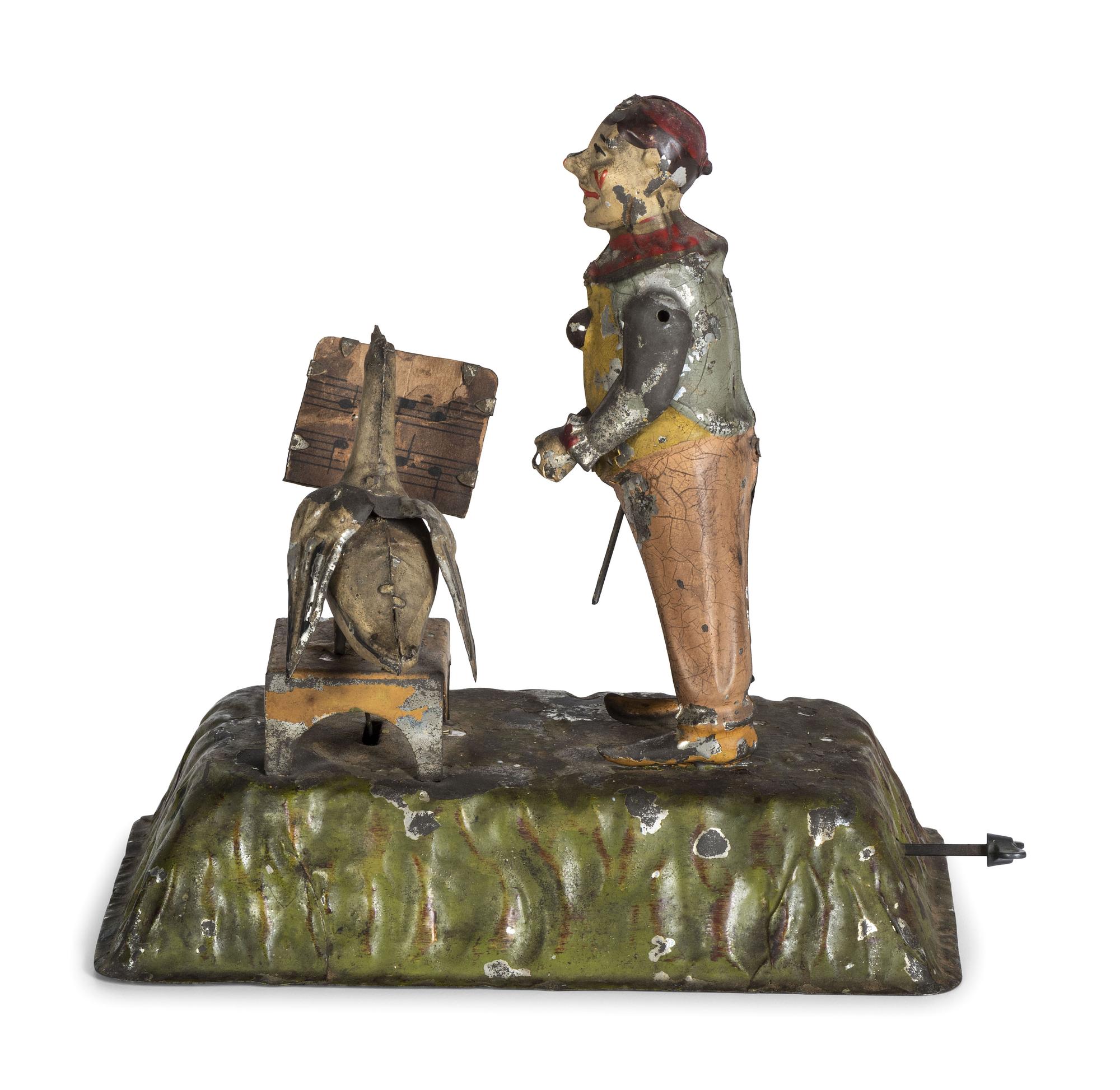 A Gunthermann Hand-Painted Tin and Paper Windup Toy