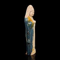 A Chinese sancai-glazed pottery attendant 三彩人物塑像 Possibly Tang dynasty ????