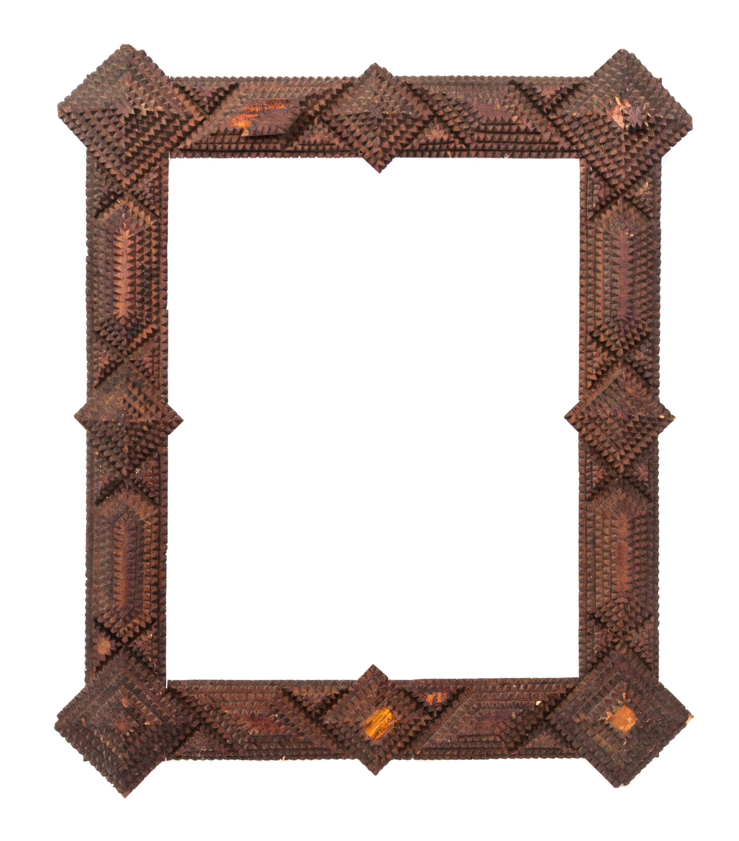 A Tramp Art Picture Frame Height 23 1/2 x width 27 1/2 inches.