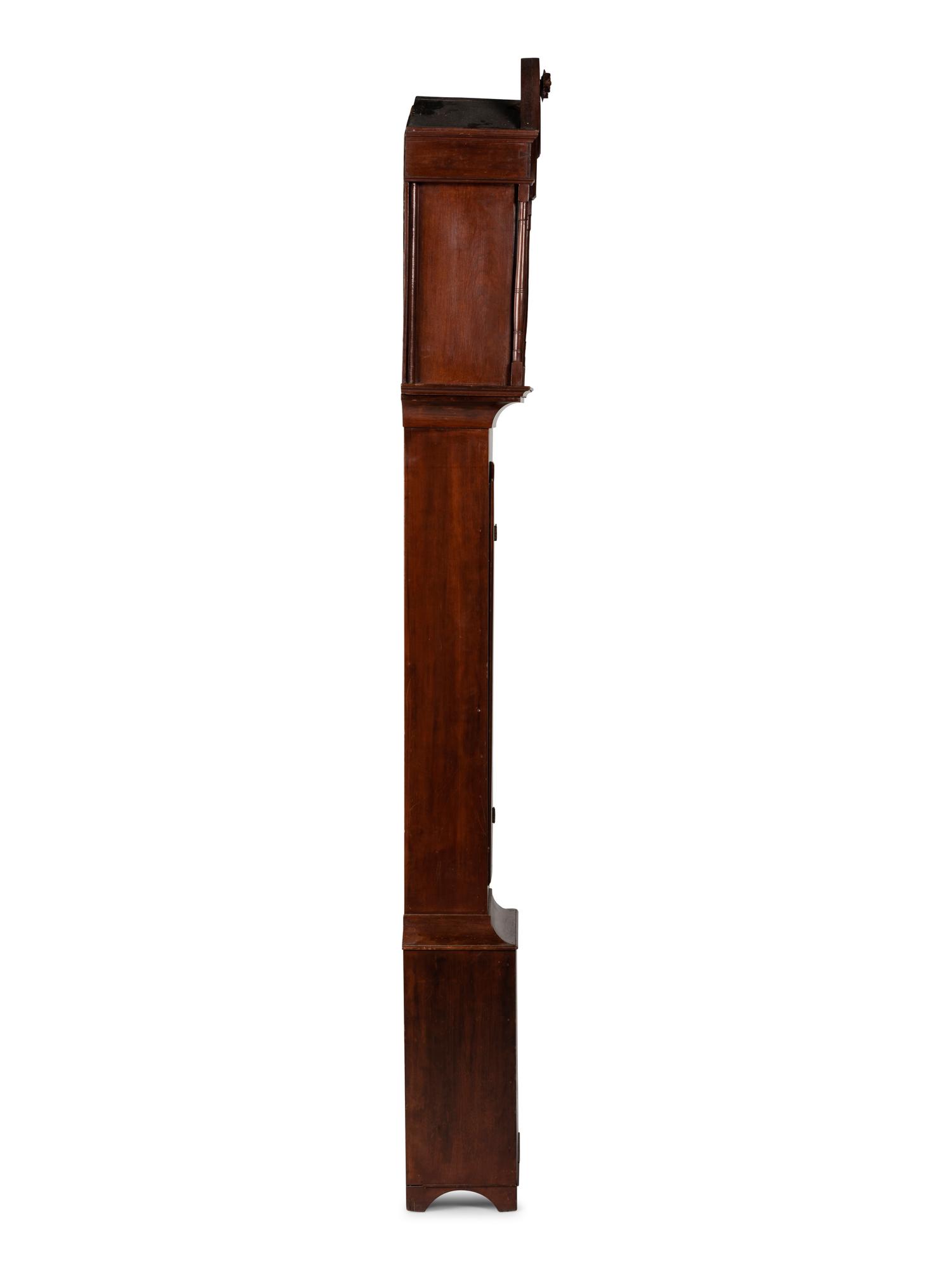 A Federal Carved Cherrywood Tall Case Clock