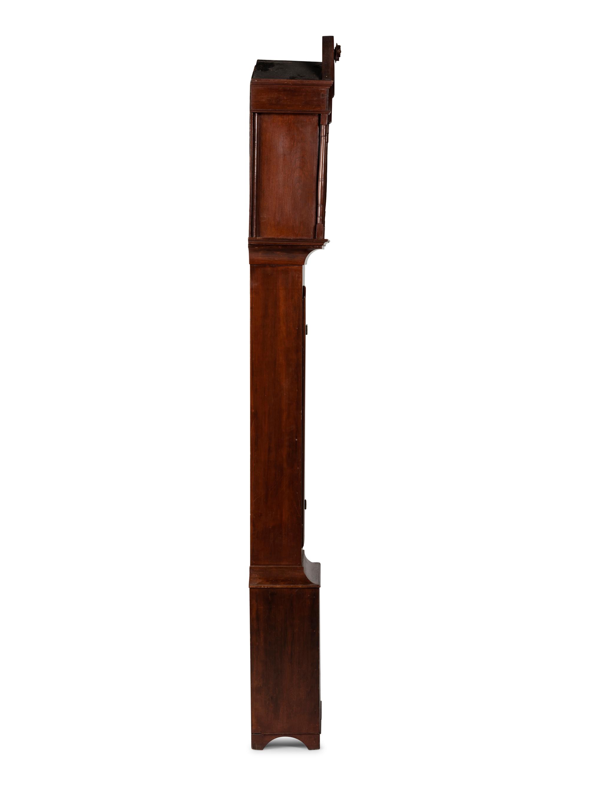 A Federal Carved Cherrywood Tall Case Clock