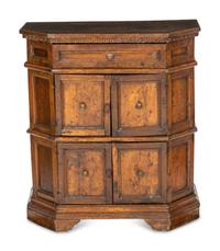 An Italian Baroque Carved Walnut Cabinet