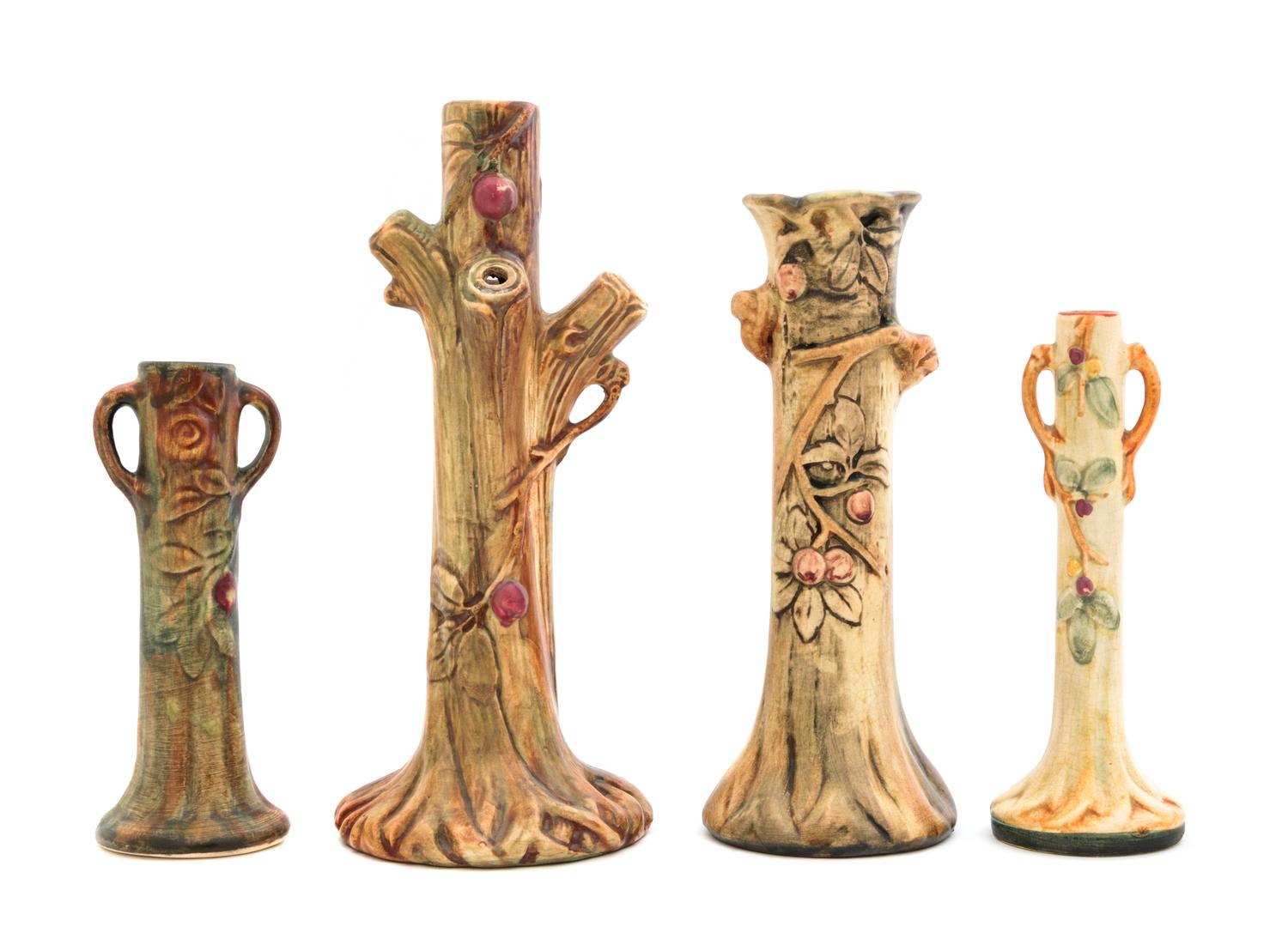 Four Weller Pottery Vases Height of tallest 10 1/2 inches.