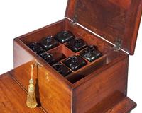 A Queen Anne Walnut Bottle Case on Stand with Drop Leaf