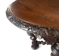 A Continental Carved Oak Center Table