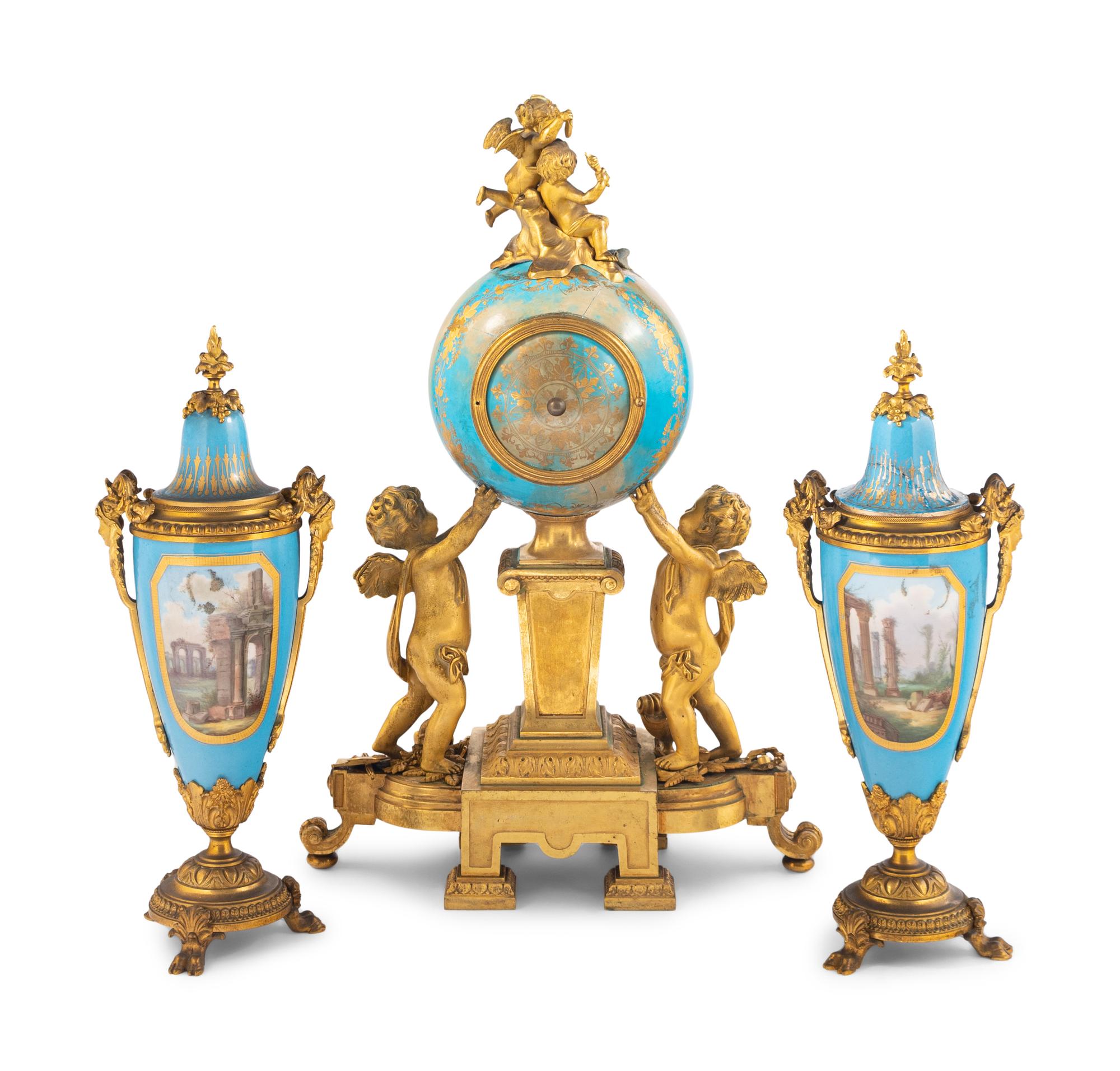 A Sèvres Style Porcelain and Gilt Bronze Mounted Three-Piece Clock Garniture
