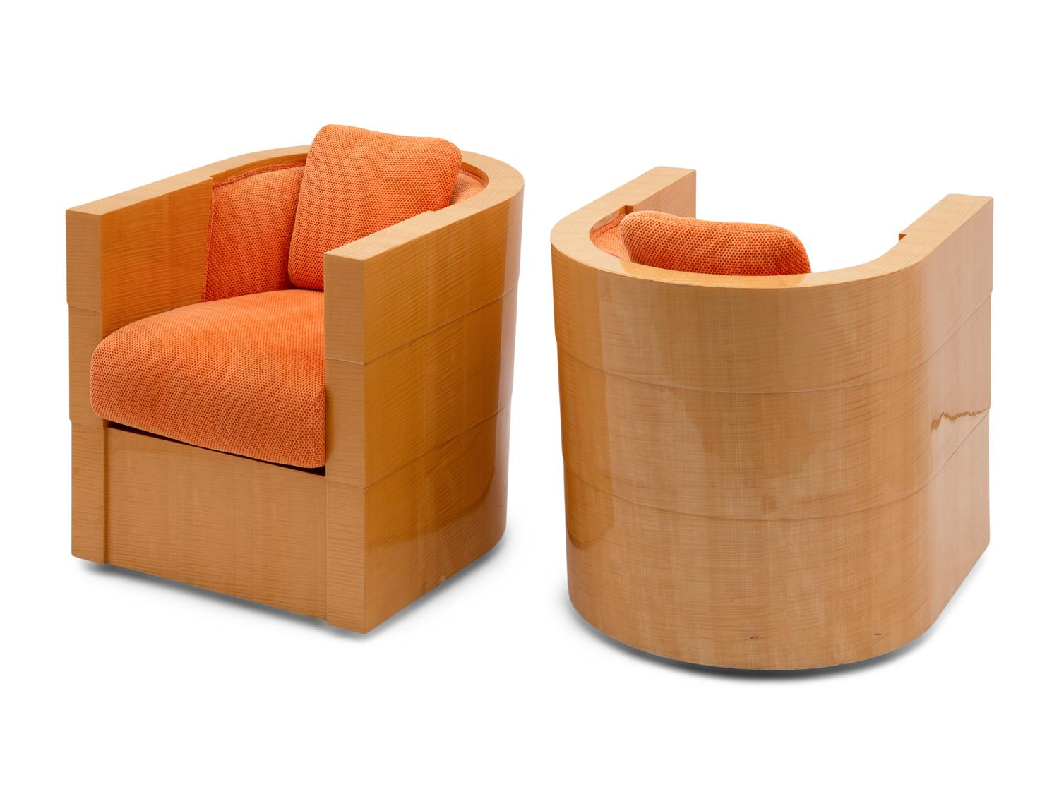 A Pair of Enrique Garcel Satinwood Club Chairs