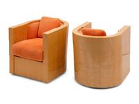 A Pair of Enrique Garcel Satinwood Club Chairs