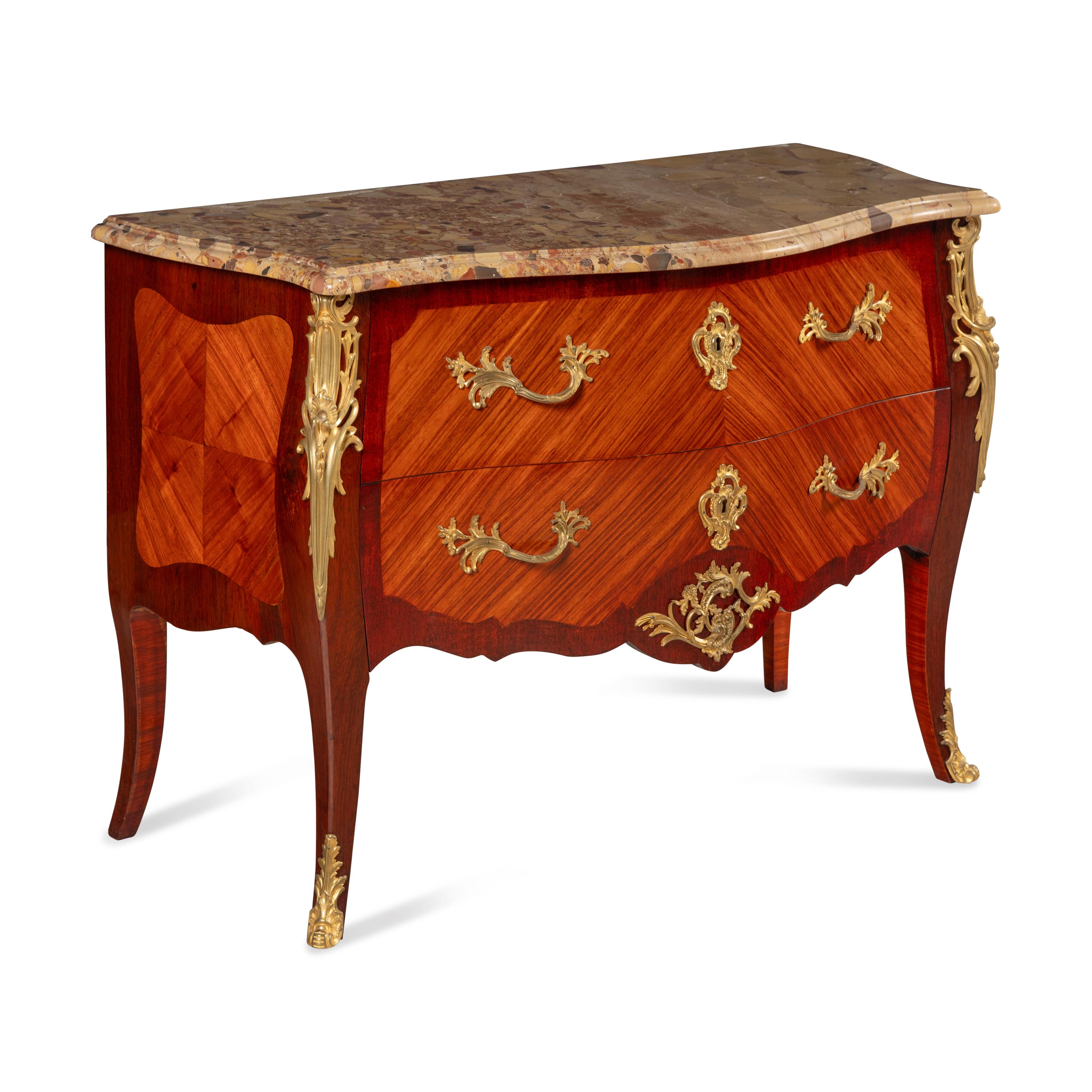 A Louis XV Style Gilt Bronze Mounted Mahogany, Kingwood and Breche d'Alep Marble-Top Commode
